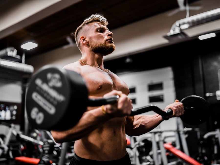 Athlete performing a barbell biceps curl